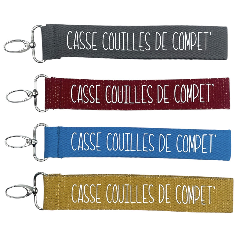 Porte clés sangle, "Casse couilles de compet"